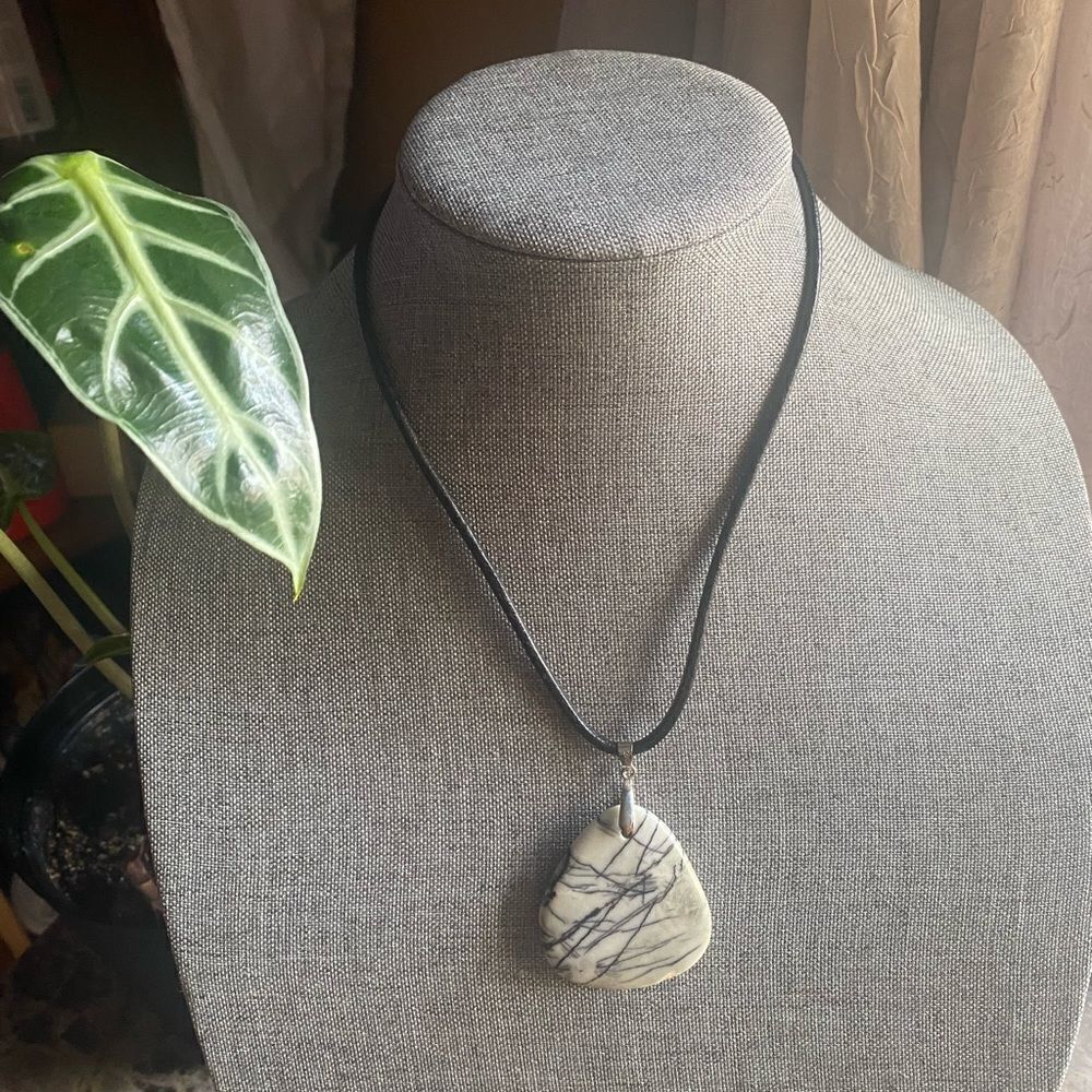 Picasso stone pendant on leather cord